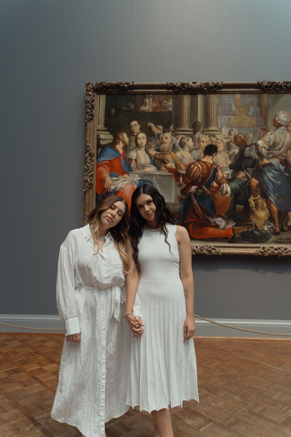 woman in white sitting on the floor