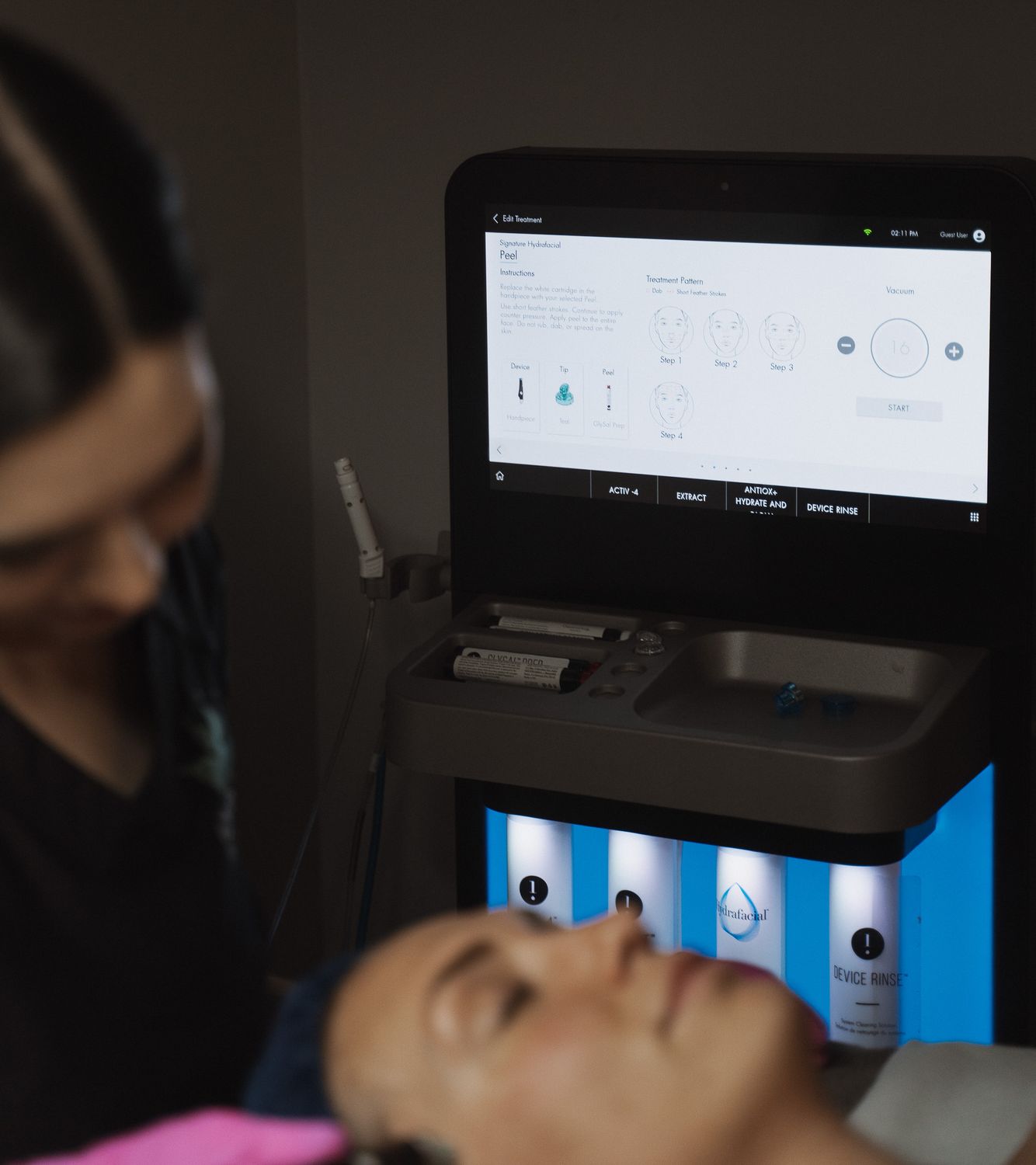 Crown Point HydraFacial model with flawless skin wearing a stylish black dress