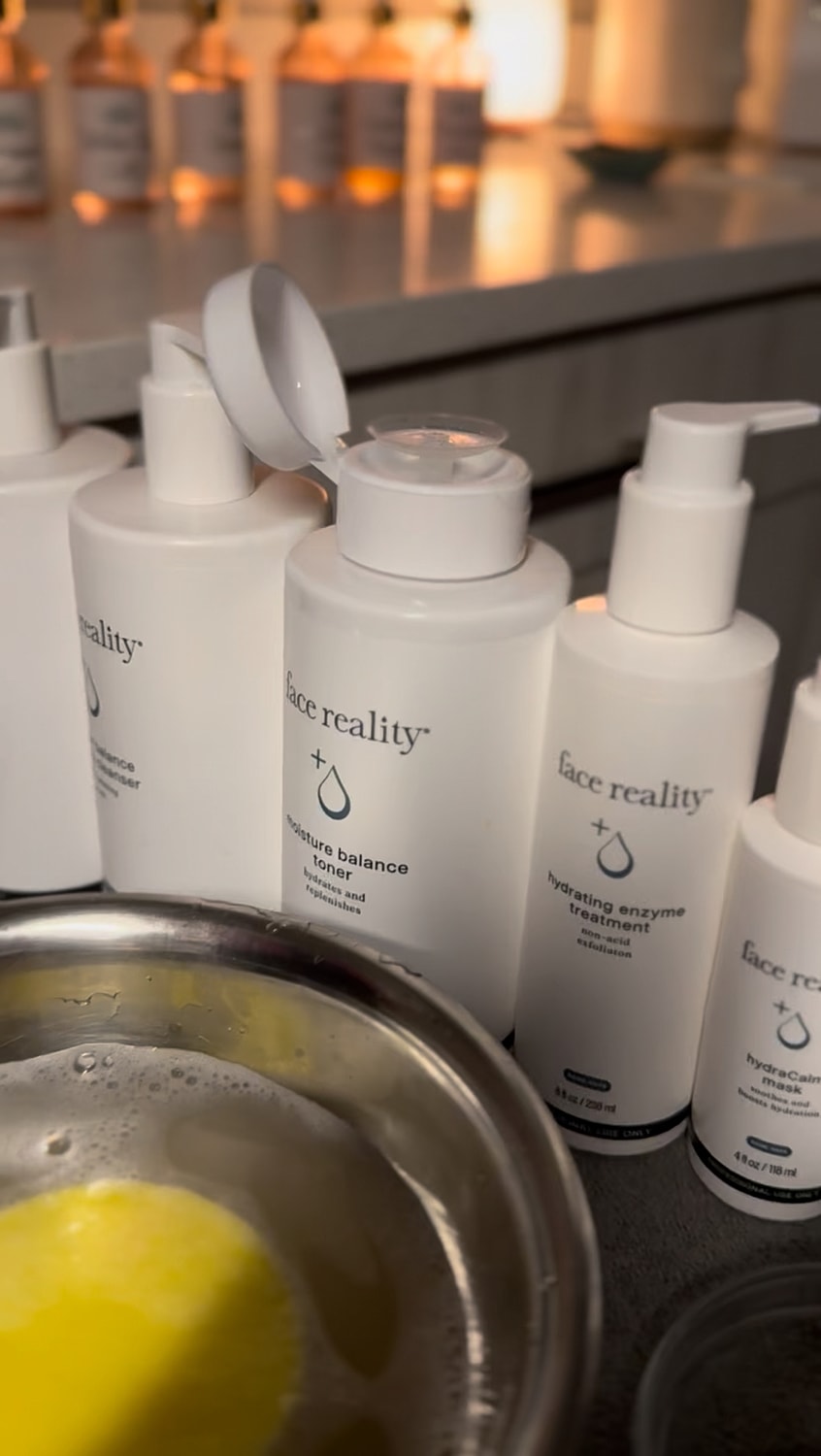 Skincare products arranged on a countertop.