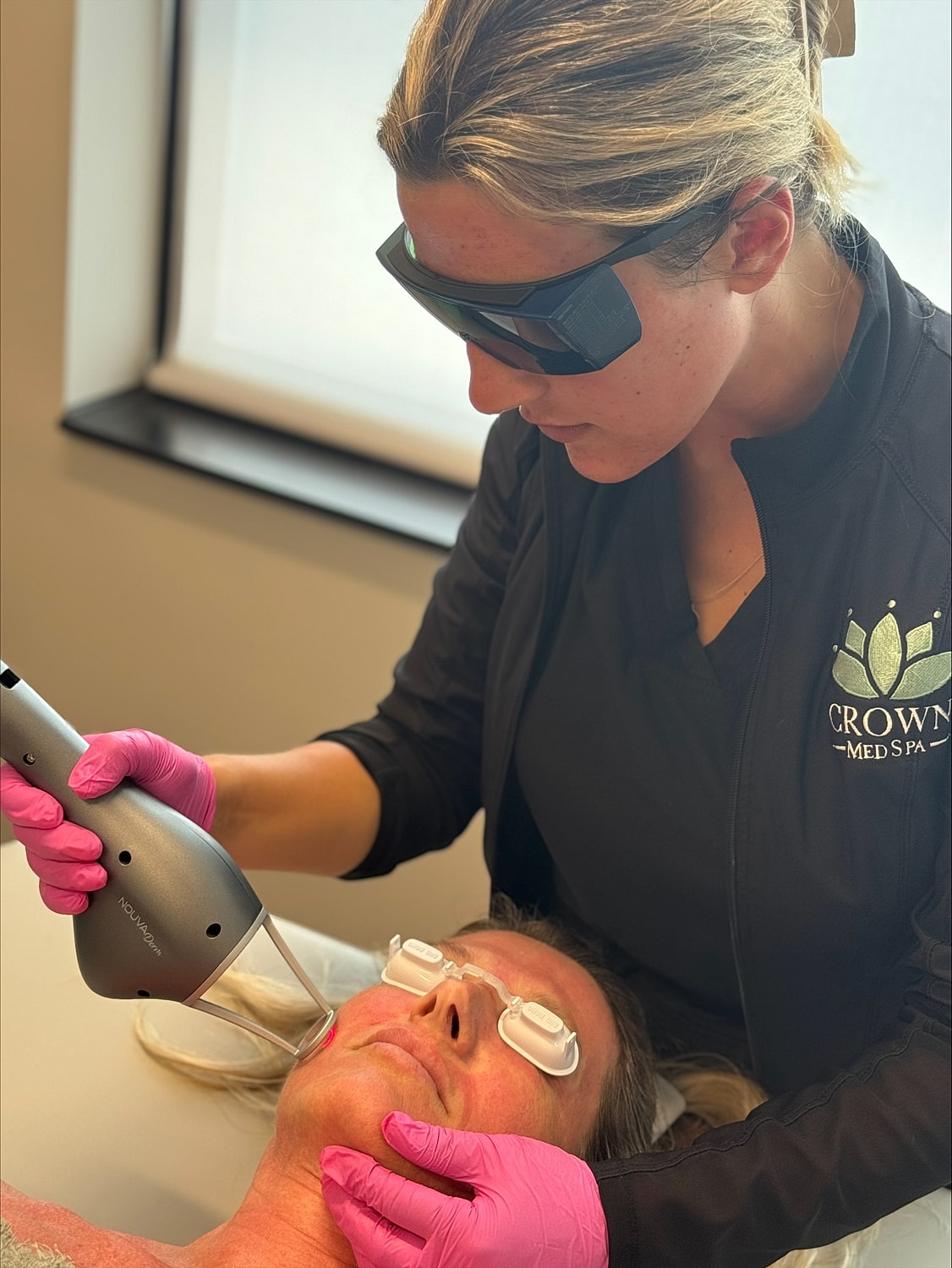Crown Med Spa patient receiving a NOUVADerm laser