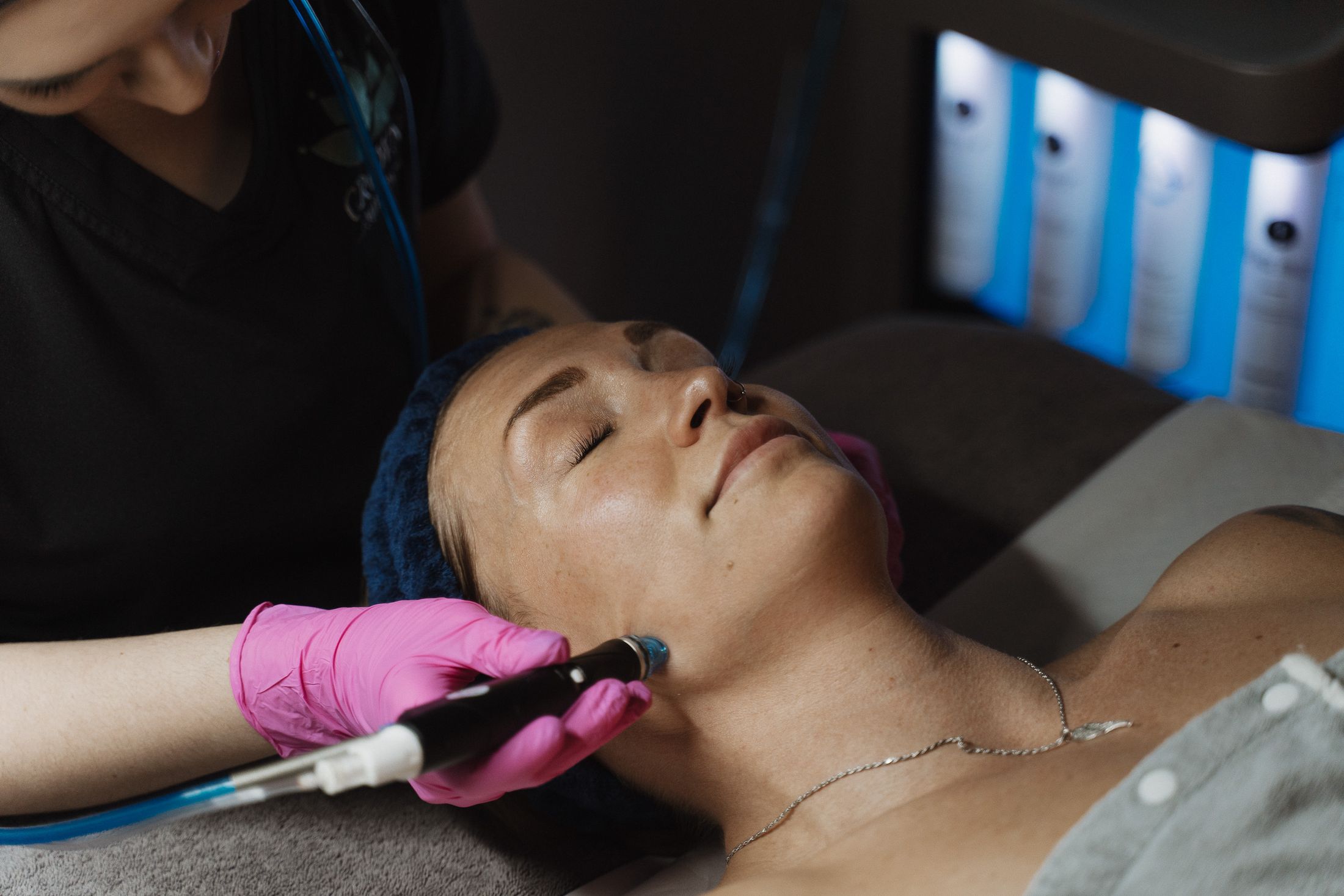 Crown Point HydraFacial patient model receiving treatment